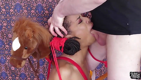 Exotic black bondage girl's face in an erotic scene