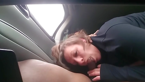 Busty blonde is fucked by a black guy in her kitchen