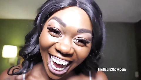 Ebony teen and her black friend have sex on the couch