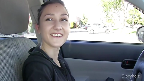 Skinny brunette in black tank with a nice face swallowing cum