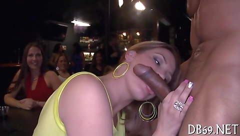 Blonde milf fucked by a black guy in an interracial group sex clip